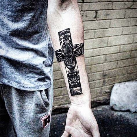 men's spiritual tattoos|religious tattoo forearm small men.